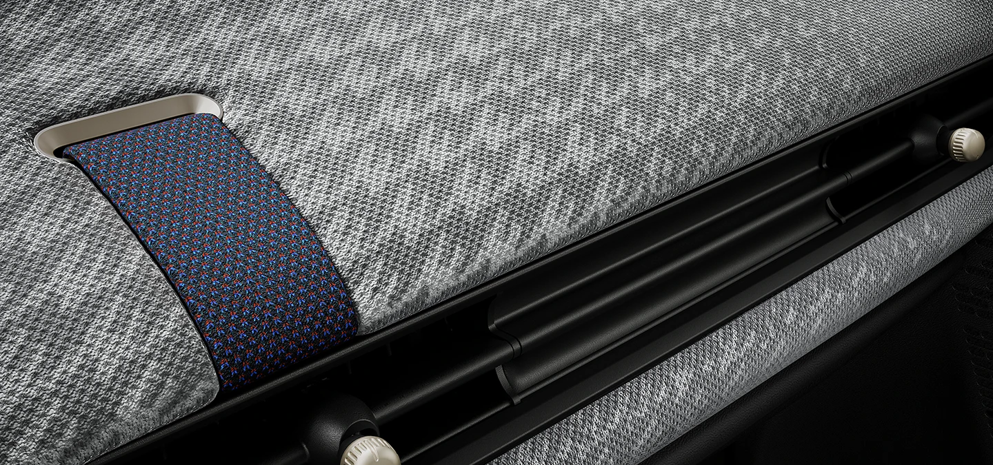 Close view of the 2D-knit dashboard inside the MINI Cooper.