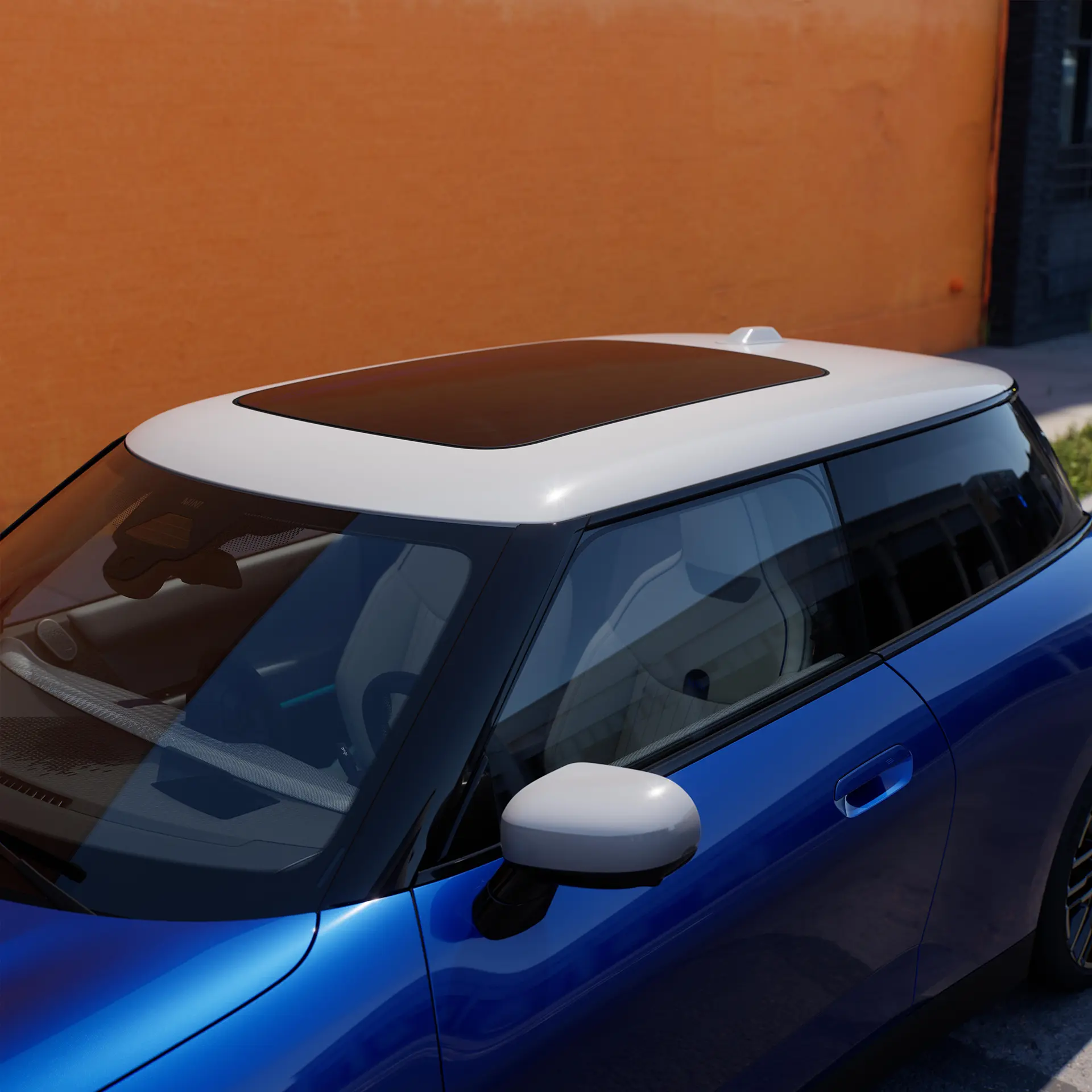 Top view of all-electric MINI Cooper in Blue with contrast roof and big glass roof