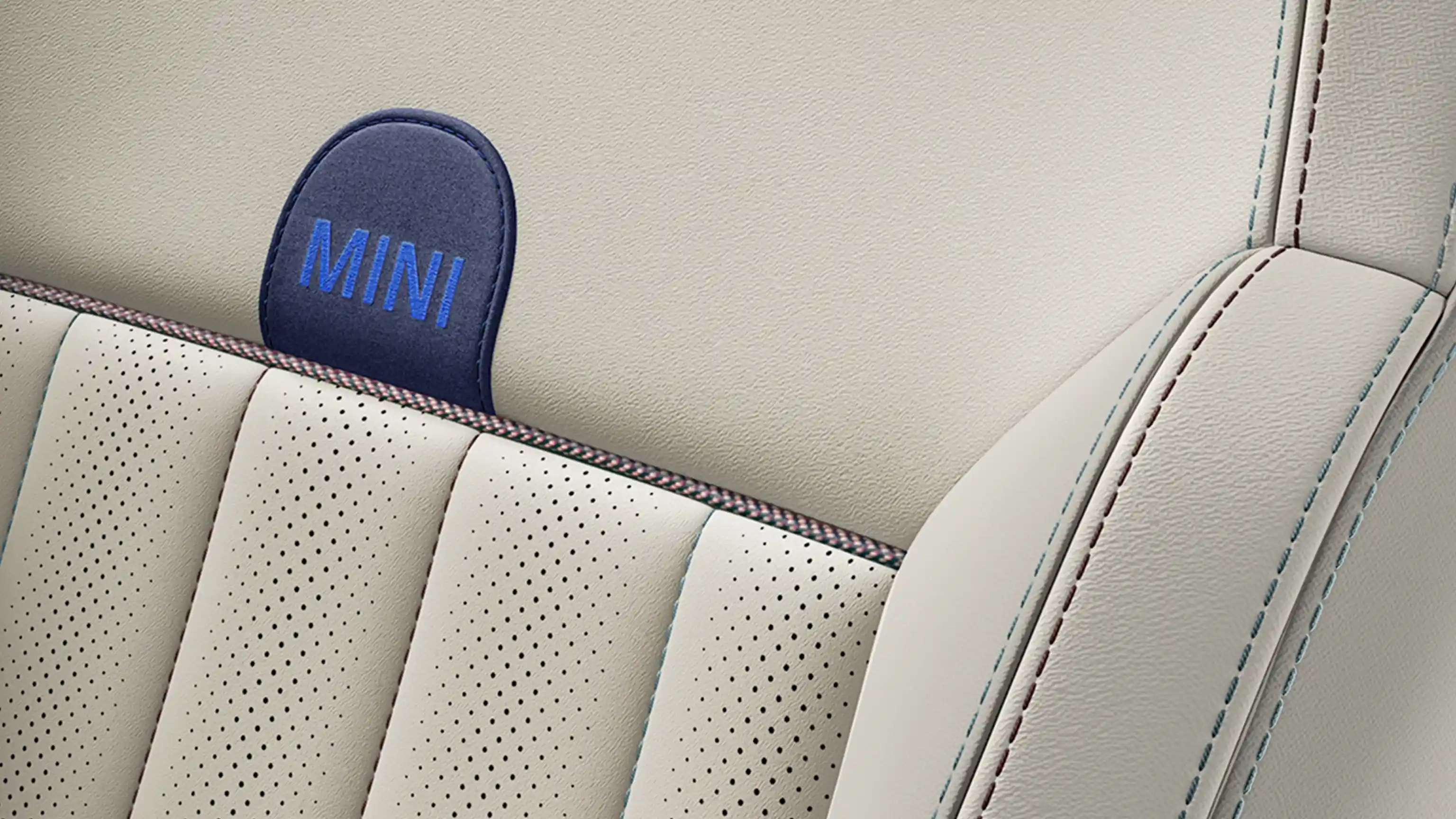 View of the all-electric MINI Countryman Exclusive Style seats in Beige Vescin