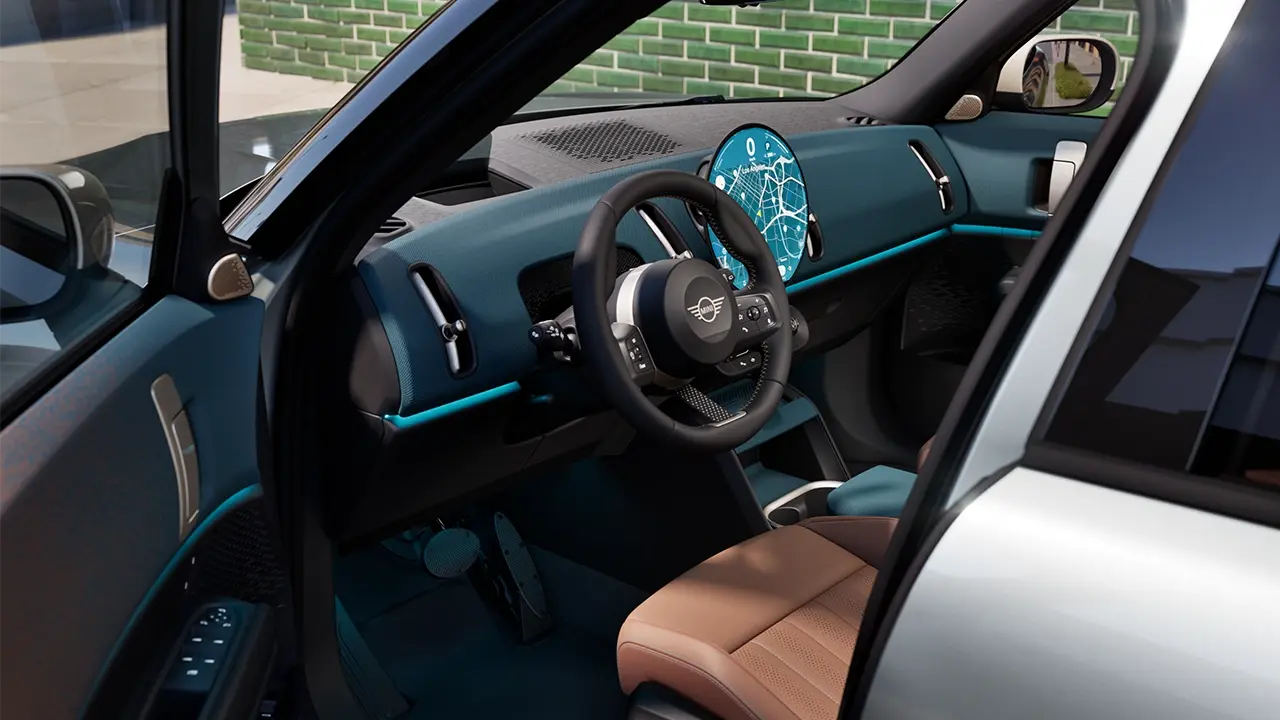 View of the MINI Countryman door entry with dashboard and Vintage Brown Vescin seats