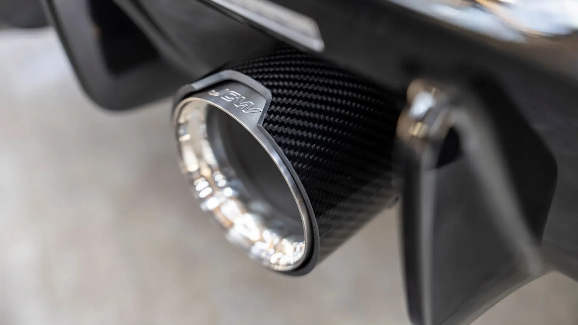 MINI John Cooper Works tailpipe trim can be attached to the exhaust system to give your vehicle that motor sport look. 