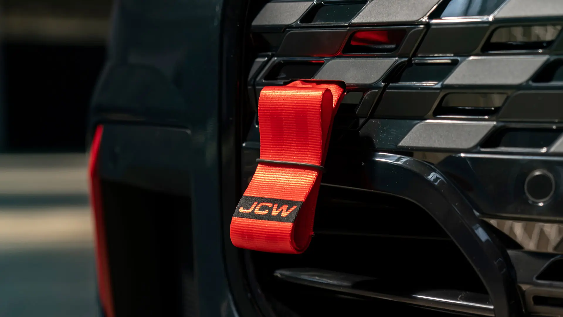 MINI John Cooper Works red tow strap with black JCW logo with a shaft length of 90 mm.