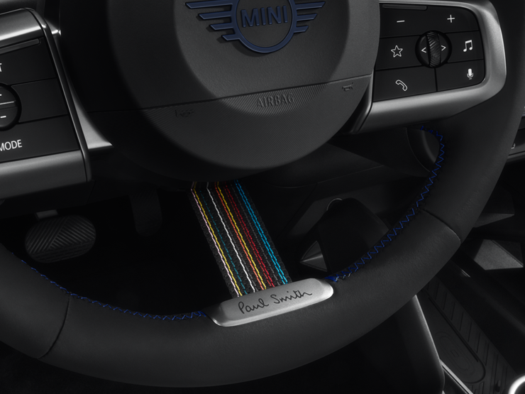 Close shot of the MINI Paul Smith Edition Steering Wheel, showcasing its unique features