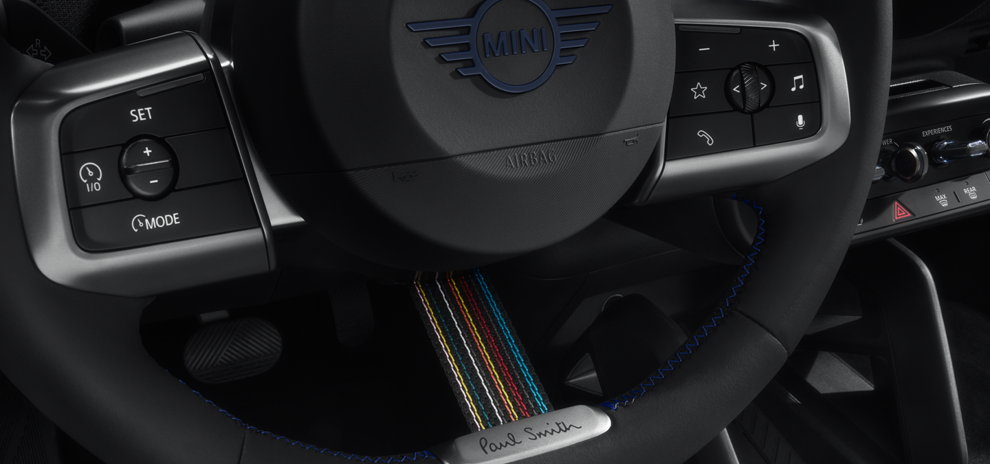 Close shot of the MINI Paul Smith Edition Steering Wheel, showcasing its unique features