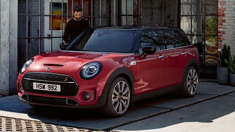 MINI Cooper red with man entering