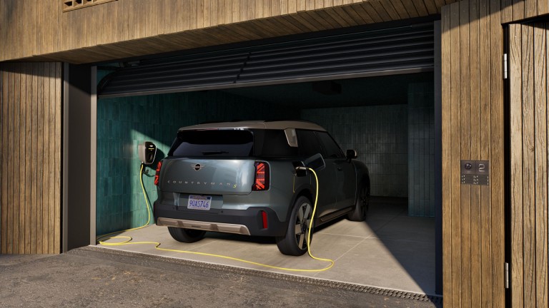 all-electric MINI Countryman charging in garage