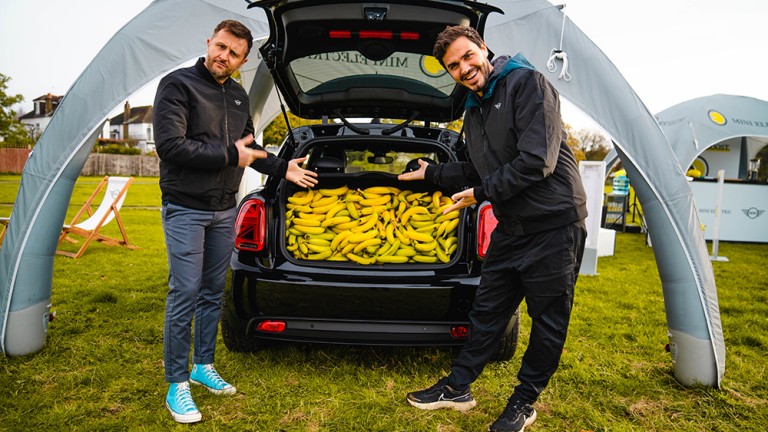 Henry and Ian with a boot full of bananas