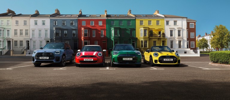 Electric MINI models displayed: Mini Cooper, Countryman, and Aceman, highlighting their unique designs.