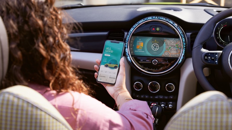 The MINI Connected tech suite being used in a MINI vehicle