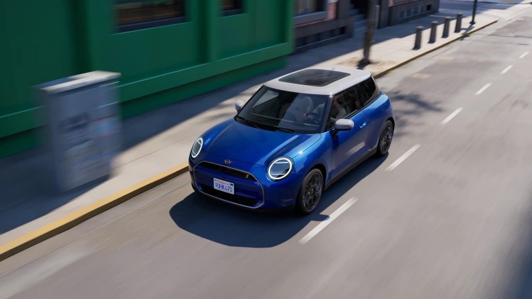 woman charging MINI Electric car