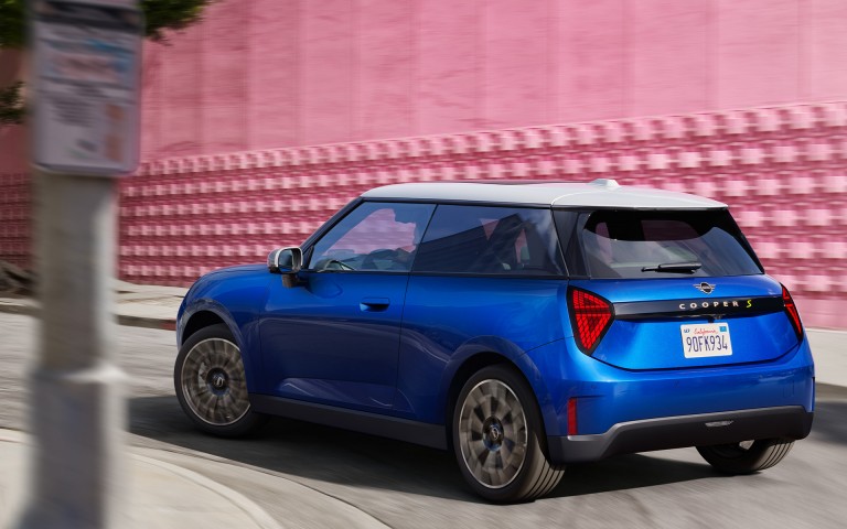 MINI Electric rear shot driving around the corner